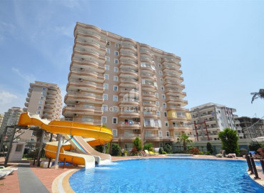 Furnished apartment 2 + 1 with a good location 400m from the sea in Mahmutlar ID-7134 фото-2