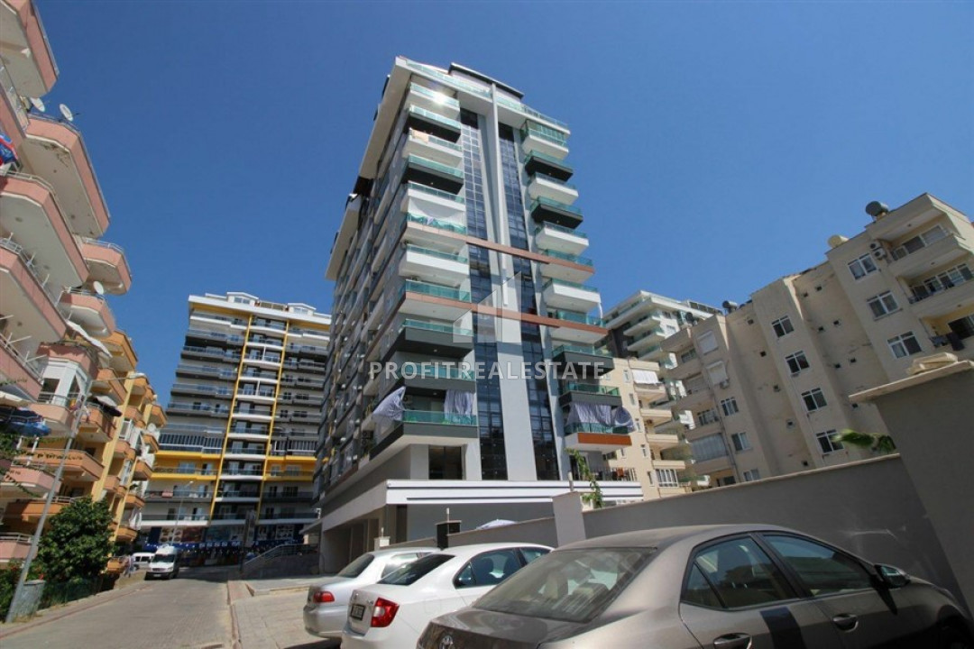 Furnished two-bedroom apartment on the central street of Mahmutlar ID-7145 фото-1