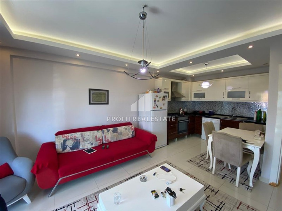 Fully equipped 1 + 1 apartment in a residence with good facilities in Mahmutlar ID-7151 фото-2