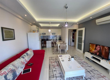 Fully equipped 1 + 1 apartment in a residence with good facilities in Mahmutlar ID-7151 фото-5