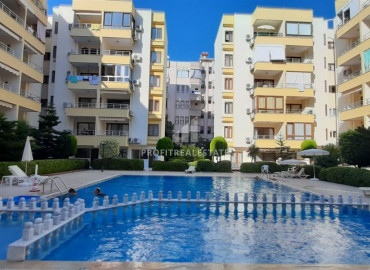 Inexpensive resale property: 1 + 1 apartment 250 m from the sea in Mahmutlar ID-7153 фото-14