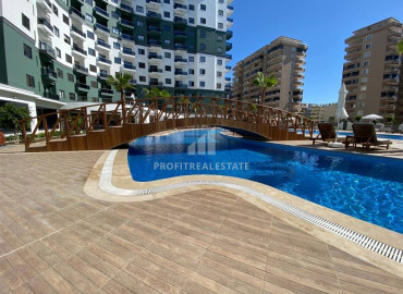 Apartment 1 + 1 in a new luxury residence close to the sea in Mahmutlar ID-7162 фото-11