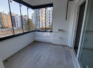 New apartment 2 + 1 600 meters from the sea in Mersin - Tece ID-7174 фото-7