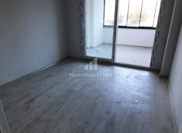 New apartment 2 + 1 600 meters from the sea in Mersin - Tece ID-7174 фото-11