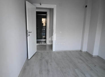 New apartment 2 + 1 600 meters from the sea in Mersin - Tece ID-7174 фото-15