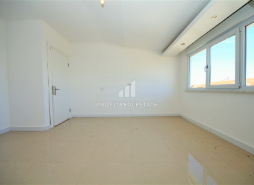 Duplex penthouse 2 + 1 without furniture and household appliances 100 meters from the sea in Kestel ID-7176 фото-12