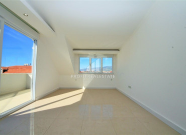 Duplex penthouse 2 + 1 without furniture and household appliances 100 meters from the sea in Kestel ID-7176 фото-13