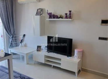 Species furnished apartment 1 + 1 in an elite residence in Mahmutlar ID-7180 фото-11