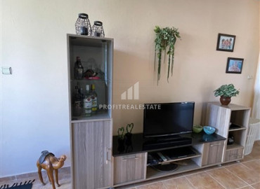 Inexpensive apartment with two bedrooms 350m from the sea, in an excellent location in Mahmutlar ID-7187 фото-3