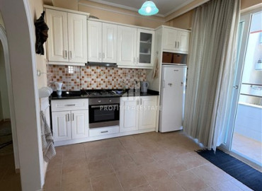 Inexpensive apartment with two bedrooms 350m from the sea, in an excellent location in Mahmutlar ID-7187 фото-4