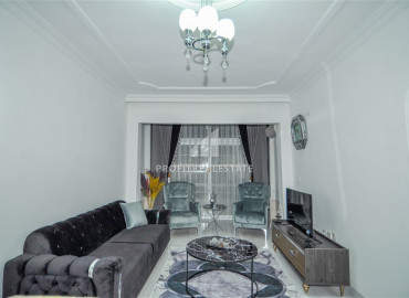 Inexpensive two-bedroom apartment 350m from the sea with furniture and household appliances in Mahmutlar ID-7199 фото-2