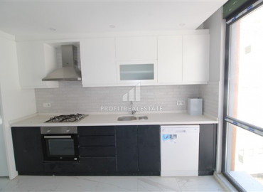 New apartment 2 + 1 with a separate kitchen in the center of Alanya, 600 meters from the Mediterranean Sea ID-7207 фото-2