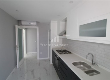 New apartment 2 + 1 with a separate kitchen in the center of Alanya, 600 meters from the Mediterranean Sea ID-7207 фото-3