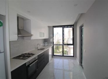 New apartment 2 + 1 with a separate kitchen in the center of Alanya, 600 meters from the Mediterranean Sea ID-7207 фото-6