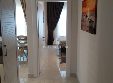 Apartment 1 + 1 with an area of 70 m2 in a luxury residence for rent in Mahmutlar ID-6815 фото-1