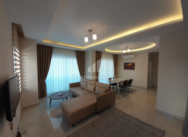 Apartment 1 + 1 with an area of 70 m2 in a luxury residence for rent in Mahmutlar ID-6815 фото-3