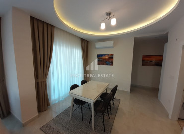 Apartment 1 + 1 with an area of 70 m2 in a luxury residence for rent in Mahmutlar ID-6815 фото-6