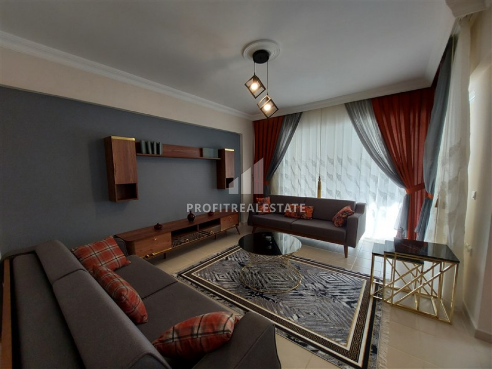 Furnished apartment 2 + 1 on the central street of Mahmutlar, 100m from the sea ID-7211 фото-2