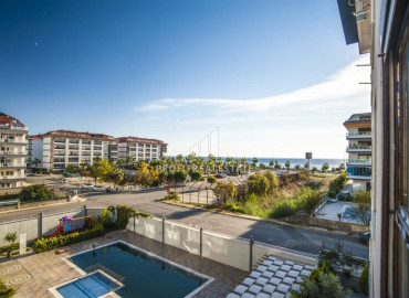 New apartment with two bedrooms in a residence with a swimming pool 200m from the sea in the Kestel area ID-7212 фото-13