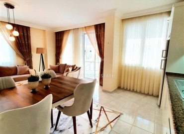 Inexpensive resale property 300m from the sea: furnished two-bedroom apartment in Mahmutlar ID-7214 фото-7
