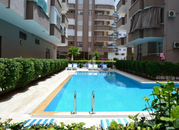 Inexpensive resale property 300m from the sea: furnished two-bedroom apartment in Mahmutlar ID-7214 фото-37