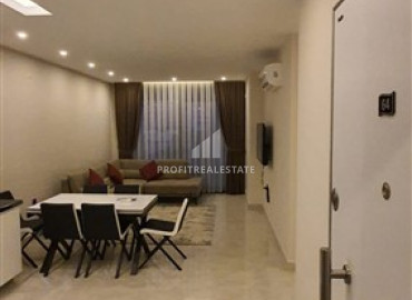 Two-bedroom apartment in a residence on the first line of the Konak Tower in Mahmutlar ID-7220 фото-6