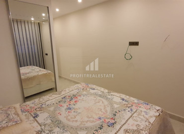 Two-bedroom apartment in a residence on the first line of the Konak Tower in Mahmutlar ID-7220 фото-12