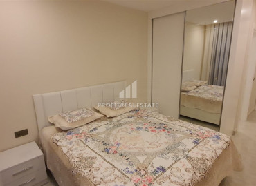 Two-bedroom apartment in a residence on the first line of the Konak Tower in Mahmutlar ID-7220 фото-16