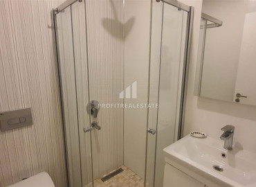 Two-bedroom apartment in a residence on the first line of the Konak Tower in Mahmutlar ID-7220 фото-17