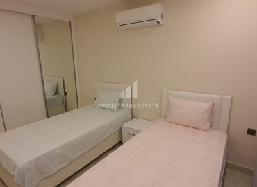 Two-bedroom apartment in a residence on the first line of the Konak Tower in Mahmutlar ID-7220 фото-19