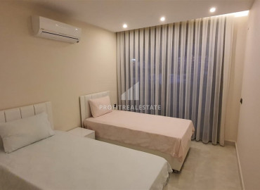 Two-bedroom apartment in a residence on the first line of the Konak Tower in Mahmutlar ID-7220 фото-24