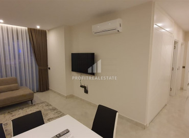 Two-bedroom apartment in a residence on the first line of the Konak Tower in Mahmutlar ID-7220 фото-26