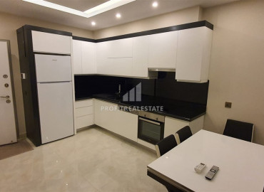 Two-bedroom apartment in a residence on the first line of the Konak Tower in Mahmutlar ID-7220 фото-27