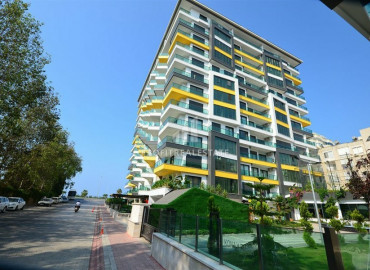 Two-bedroom apartment in a residence on the first line of the Konak Tower in Mahmutlar ID-7220 фото-1