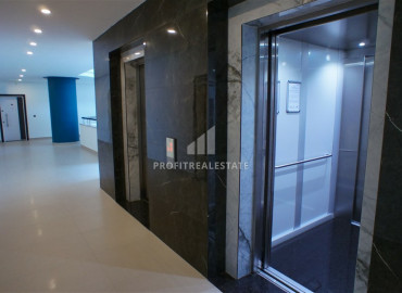 Two-bedroom apartment in a residence on the first line of the Konak Tower in Mahmutlar ID-7220 фото-30