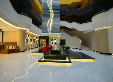 Two-bedroom apartment in a residence on the first line of the Konak Tower in Mahmutlar ID-7220 фото-34