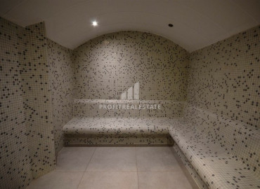 Two-bedroom apartment in a residence on the first line of the Konak Tower in Mahmutlar ID-7220 фото-45