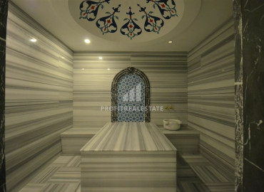 Two-bedroom apartment in a residence on the first line of the Konak Tower in Mahmutlar ID-7220 фото-47