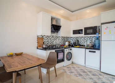 In a new residence in Mahmutlar - furnished 1 + 1 apartment with an area of 65m² ID-7234 фото-11