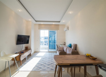In a new residence in Mahmutlar - furnished 1 + 1 apartment with an area of 65m² ID-7234 фото-12