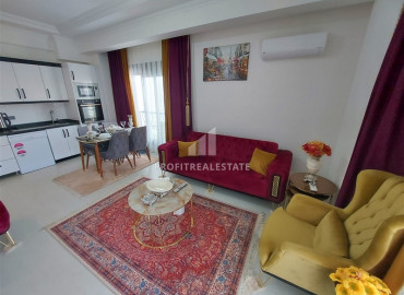 Двухкомнатные апартаменты с мебелью, в жилом комплексе 2020 года строительства, в центре Махмутлара, 55 м2 ID-7240 фото-4