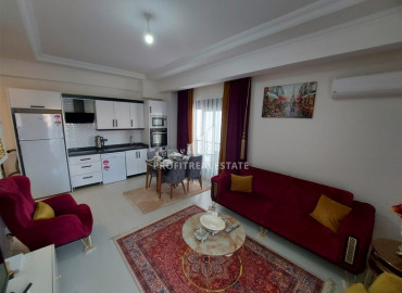 One-bedroom apartment without furniture, in a residential residence built in 2020, in the center of Mahmutlar, 55 m2 ID-7240 фото-5