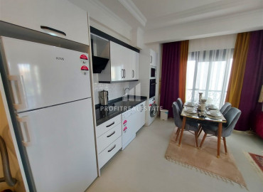 Двухкомнатные апартаменты с мебелью, в жилом комплексе 2020 года строительства, в центре Махмутлара, 55 м2 ID-7240 фото-9