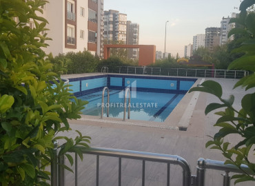 Large apartment with two bedrooms in a residence with a swimming pool in Tej, Mersin, 300m from the sea ID-7251 фото-2