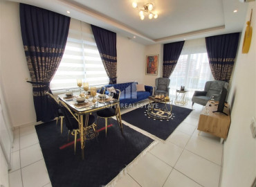 Furnished two-bedroom apartment in Mahmutlar, in a residence with good facilities ID-7256 фото-1