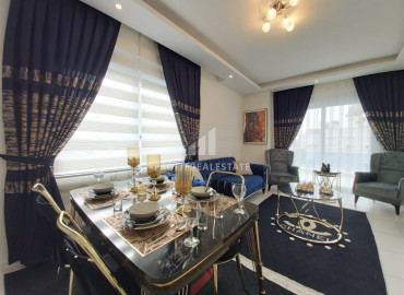 Furnished two-bedroom apartment in Mahmutlar, in a residence with good facilities ID-7256 фото-2