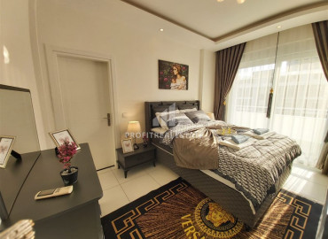 Меблированная квартира с двумя спальнями в Махмутларе, в резиденции с хорошей инфраструктурой ID-7256 фото-5