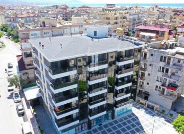 Apartment 1 + 1 in a new building in the center of Alanya, in a residence with facilities. ID-7270 фото-1