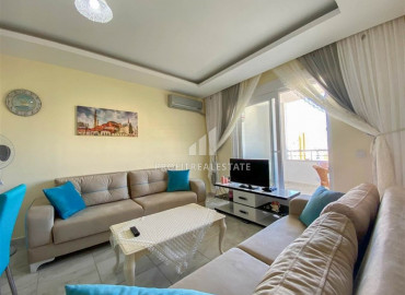 Меблированная  двухкомнатная квартира, с отличными видовыми характеристиками, в Махмутларе, Аланья, 60 м2 ID-7275 фото-1