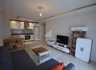 Apartment 1 + 1 with furniture and household appliances in a residence with a swimming pool in Oba ID-7301 фото-1}}